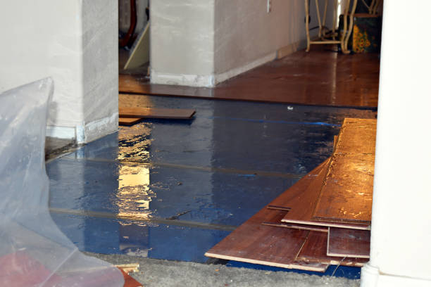 Professional Flood Damage Restoration technician working in Heber, UT